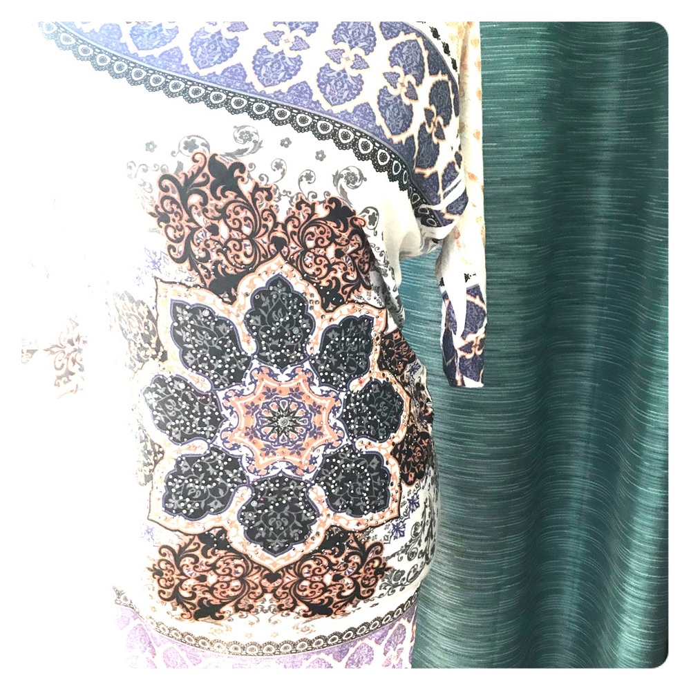 Sweater mandala dress with embellishments.